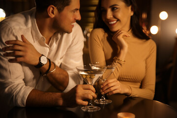 Man and woman flirting with each other in bar