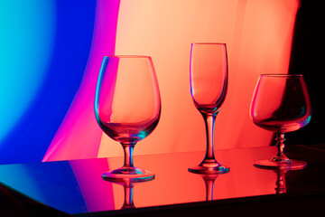 glass glasses on a multicolored background