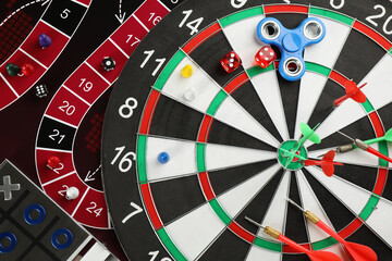 Obraz premium Different types of board games and its' components as background, top view