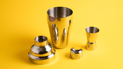Cobbler shaker and jigger. Vertical image. Bar accessories. Cocktail utensils. Set of bar tools