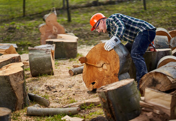 Lumberjack with chainsaw working