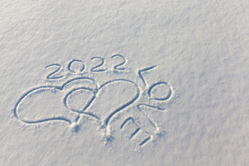 drawn in the winter season, the heart on the snow