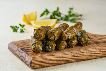 Stuffed grape leaves  rolls dolma. Traditional middetarean ,caucasian ,turkish and arabic  cuisine  . Closeup