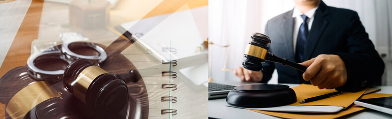 Justice and law concept.Male judge in a courtroom with the gavel, working with, computer and docking keyboard, eyeglasses, on table in morning light