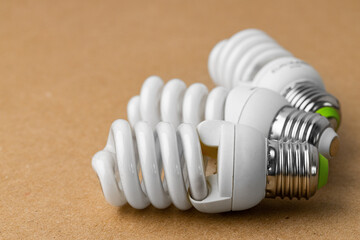 Light bulb on craft paper background close up