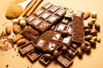  milk chocolates. Almond, pistachio, hazelnut.. background, texture..