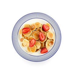 Plate with tasty mini pancakes and strawberry on white background