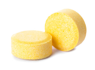 Folic acid pills on white background