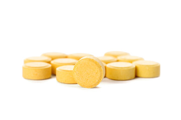 Folic acid pills on white background