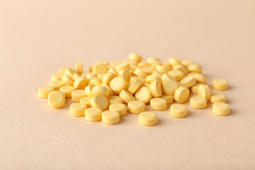 Folic acid pills on color background