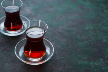Two glasses of black strong turkish tea. Healthy break relax concept. Slow life, copy space