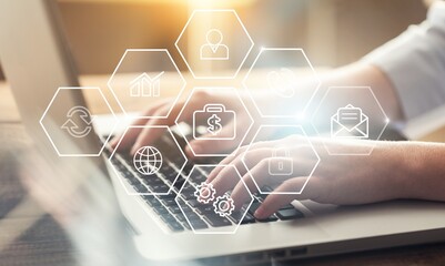 Woman typing computer.