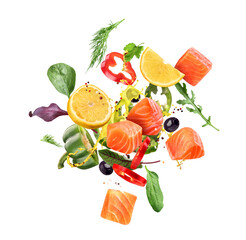 Pieces of red fish with greens and lemon in the air on a white background