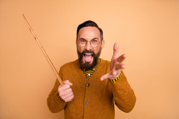 Photo of furious mature man teacher scream school problem hold pointer isolated over beige color background