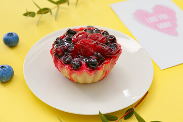 Tasty breakfast for mother on color background