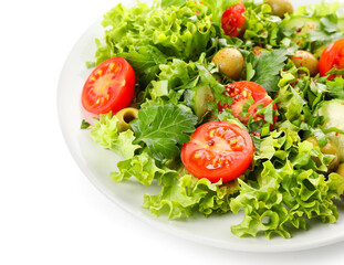 Plate of fresh salad with vegetables on white background