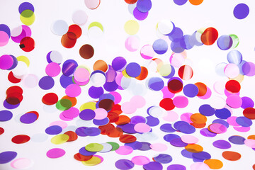 Festive, multicolored paper confetti in the form of circles isolated on white background