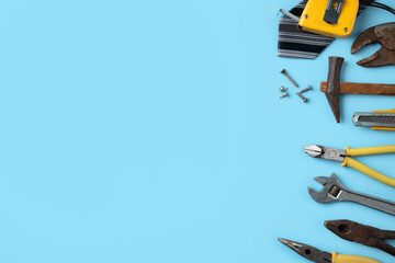 Top view design concept of Father's day with working tools on blue background.