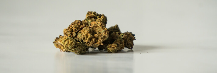 Legal, dry cannabis cbd marijuana for health and private use in the isolated bright studio. 