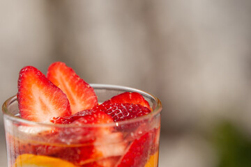 glass of water with fresh fruit
