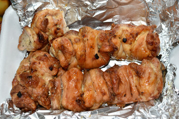Fried chicken shish kebab in a foil backing