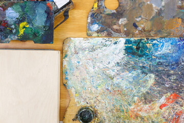 flatley top view on artist's objects palette for mixing paints