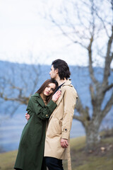 Beautiful sensual portrait of young stylish couple in love.Image of adorable brunette couple in love. Happy family.