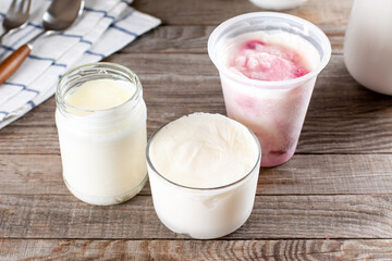 Obraz na płótnie Canvas Frozen dairy products. Frozen sour cream. Frozen yogurt on a table