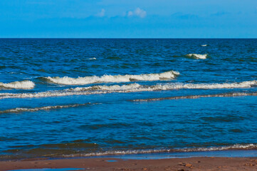Clean sand beach and blue sky and sea