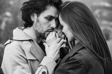 Beautiful sensual portrait of young stylish couple in love.Image of adorable brunette couple in love. Happy family.