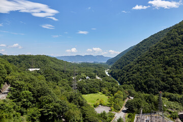 Fototapeta na wymiar 夏、大町ダムから見た大町市の風景 長野県