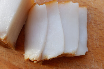 four pieces of delicious lard close-up. food background