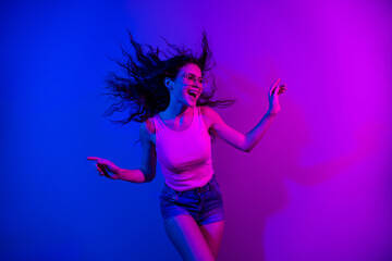 Fototapeta na wymiar Portrait of excited cheerful lady chilling have fun open mouth smile free time isolated on gradient background