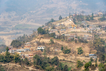 Fototapeta na wymiar House Covered Hillside in Nepal