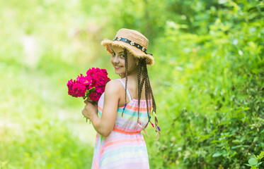 childhood happiness. summer vacation. cheerful child in summer clothes. spring kid fashion