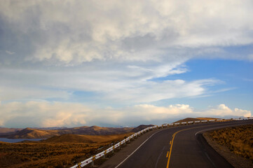 Landscape with a sunset view of the road through altiplano, Peru.