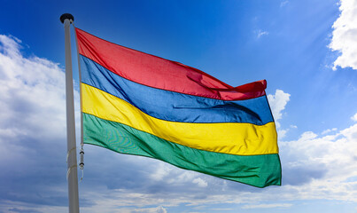 Mauritius flag waving against blue cloudy sky