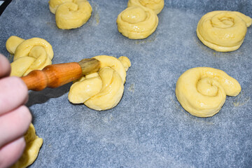 Juda's ropes brushed with beaten eggs before baking