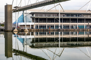 Naklejka premium Reflections on the water of the Royal Victoria Docks, London