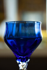 blue vintage wine glass close-up. antique wine glass
