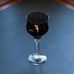 brown vintage wine glass close-up. antique wine glass