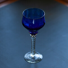 blue vintage wine glass close-up. antique wine glass