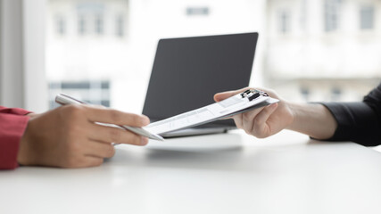 Employer or HR department is reading the resume and interviewing the ability of new employees, Employer is selecting job applicants, Employment and Recruitment Concept.