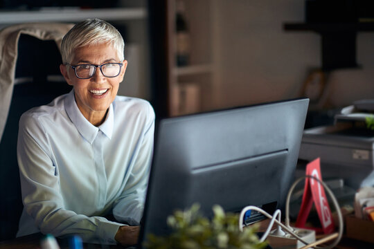 Portrait of a happy senior businesswoman working