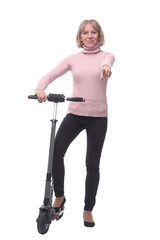 Full length portrait of a woman riding a scooter