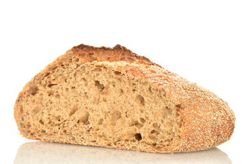 One half of a loaf of bread, close-up, isolated on white.