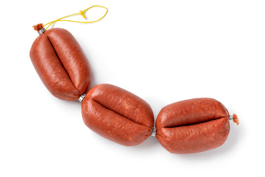 Traditional Turkish halal sucuk, a dry, spicy and fermented sausage isolated on white background 