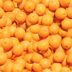 Pattern made from bunch of oranges. Top view, flat design. Healthy food.