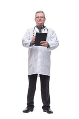 Portrait of confident mature medical doctor writing on clipboard