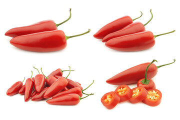 Red jalapeno peppers (capsicum) and a cut one on a white background